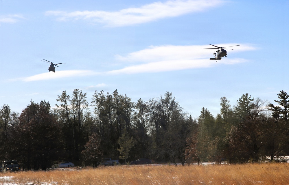 2nd Battalion, 147th Aviation Regiment helicopters, crews support sling-load training event with artillery unit at Fort McCoy