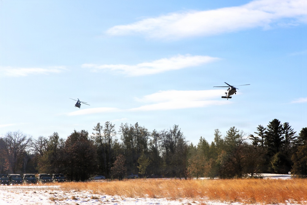 2nd Battalion, 147th Aviation Regiment helicopters, crews support sling-load training event with artillery unit at Fort McCoy