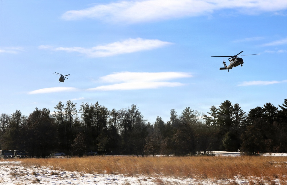 2nd Battalion, 147th Aviation Regiment helicopters, crews support sling-load training event with artillery unit at Fort McCoy