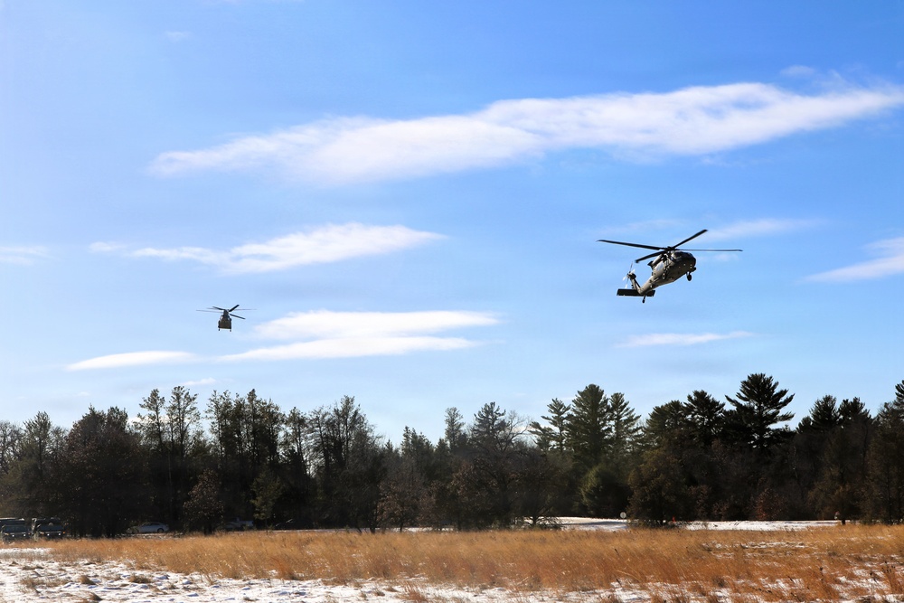 2nd Battalion, 147th Aviation Regiment helicopters, crews support sling-load training event with artillery unit at Fort McCoy
