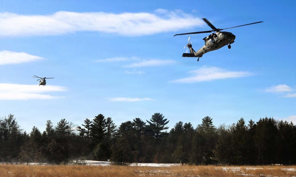 2nd Battalion, 147th Aviation Regiment helicopters, crews support sling-load training event with artillery unit at Fort McCoy