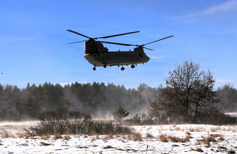 2nd Battalion, 147th Aviation Regiment helicopters, crews support sling-load training event with artillery unit at Fort McCoy