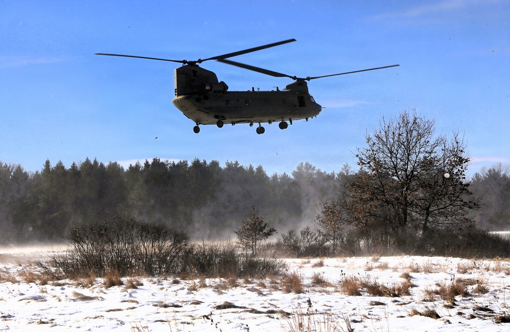 2nd Battalion, 147th Aviation Regiment helicopters, crews support sling-load training event with artillery unit at Fort McCoy