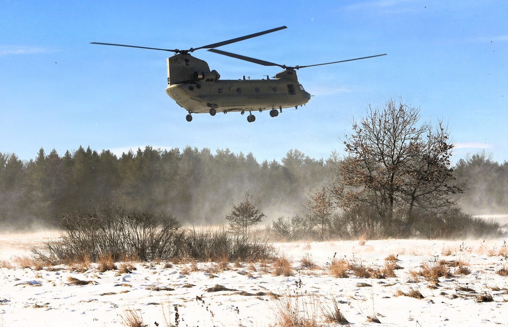 2nd Battalion, 147th Aviation Regiment helicopters, crews support sling-load training event with artillery unit at Fort McCoy
