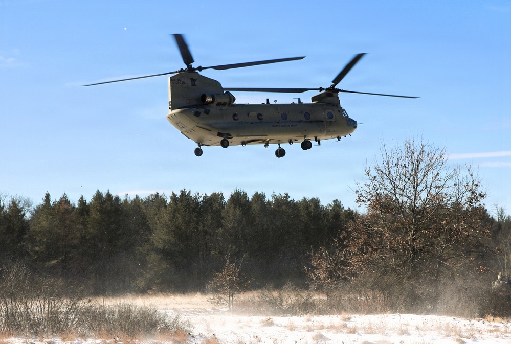2nd Battalion, 147th Aviation Regiment helicopters, crews support sling-load training event with artillery unit at Fort McCoy