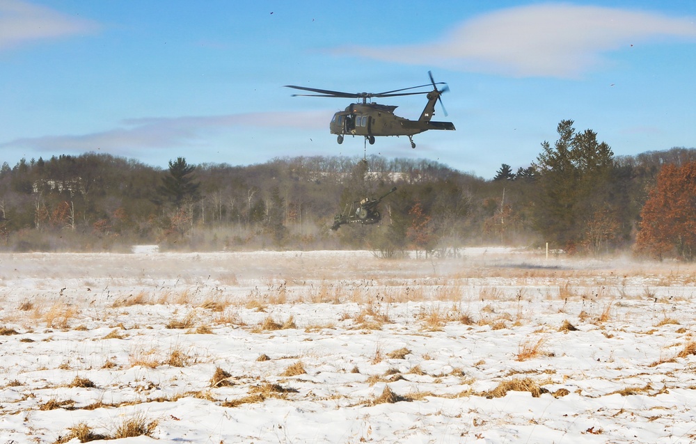 2nd Battalion, 147th Aviation Regiment helicopters, crews support sling-load training event with artillery unit at Fort McCoy