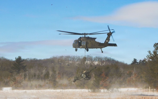 2nd Battalion, 147th Aviation Regiment helicopters, crews support sling-load training event with artillery unit at Fort McCoy