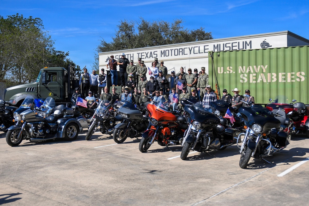 Sailors from the USS Gonzalez, Seabees from NMCB 133, and Pilots from TW4 pose with AL Motorcycle Club in front of the South Texas Motorcycle Museum