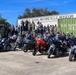 Sailors from the USS Gonzalez, Seabees from NMCB 133, and Pilots from TW4 pose with AL Motorcycle Club in front of the South Texas Motorcycle Museum
