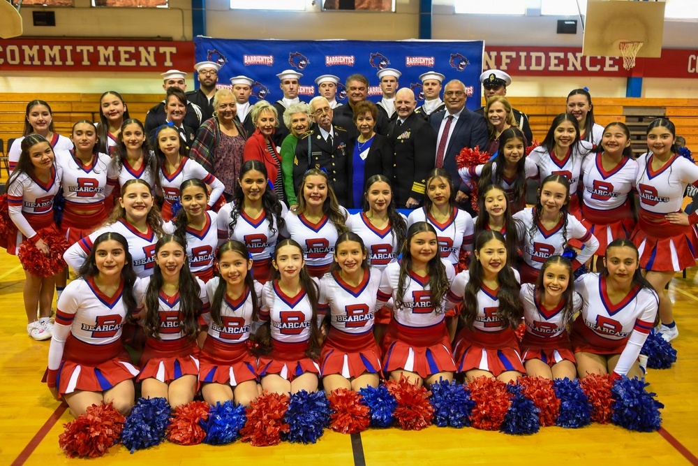 Admiral Faehnle visits Barrientes Middle School during school hours to present a challenge coin to Sargent Barrientes