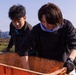 MCAS Iwakuni Volunteers and local community dig up Lotus Roots