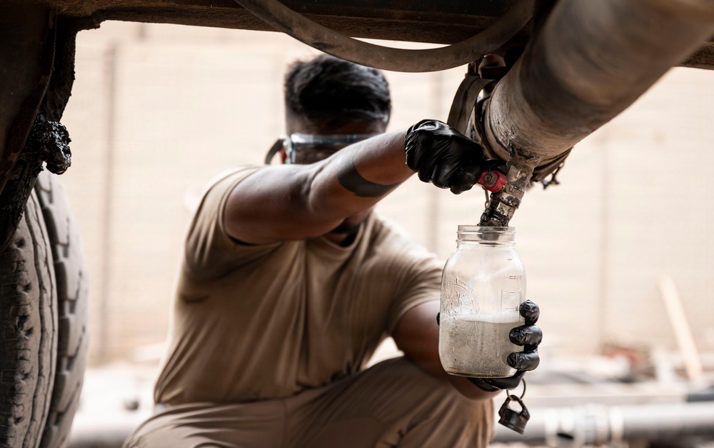 POL Airmen conduct fuel sampling and maintenance operations
