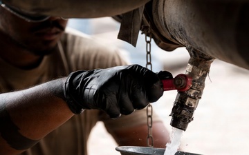 POL Airmen conduct fuel sampling and maintenance operations