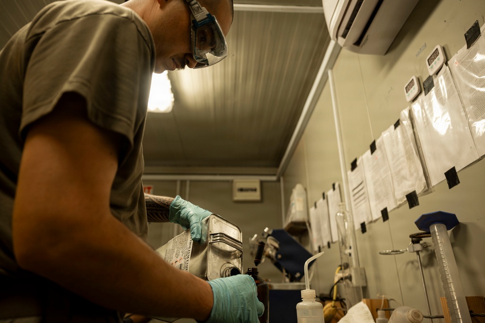 POL Airmen conduct fuel sampling and maintenance operations
