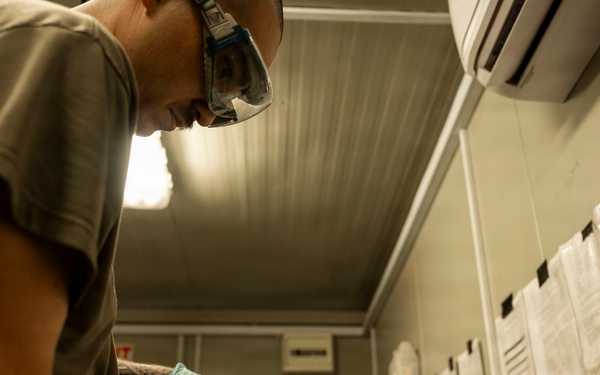 POL Airmen conduct fuel sampling and maintenance operations