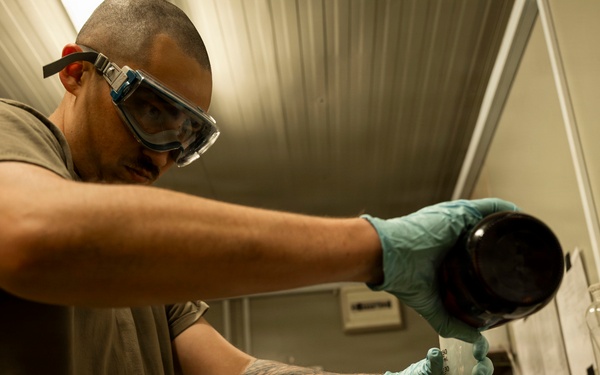 POL Airmen conduct fuel sampling and maintenance operations