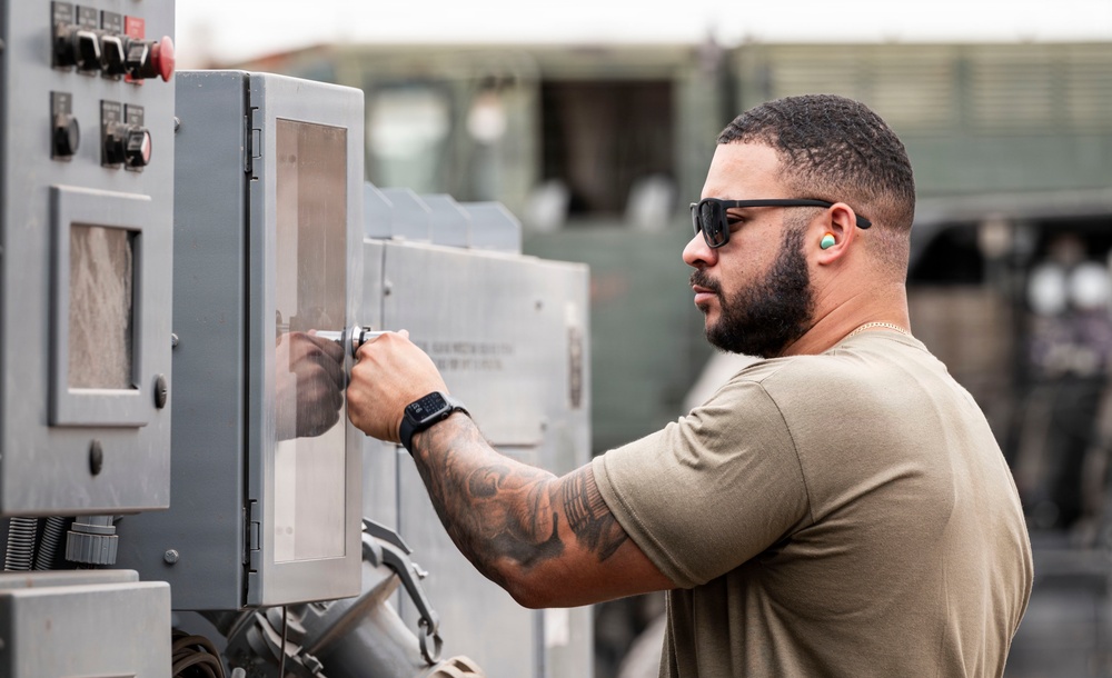 POL Airmen conduct fuel sampling and maintenance operations