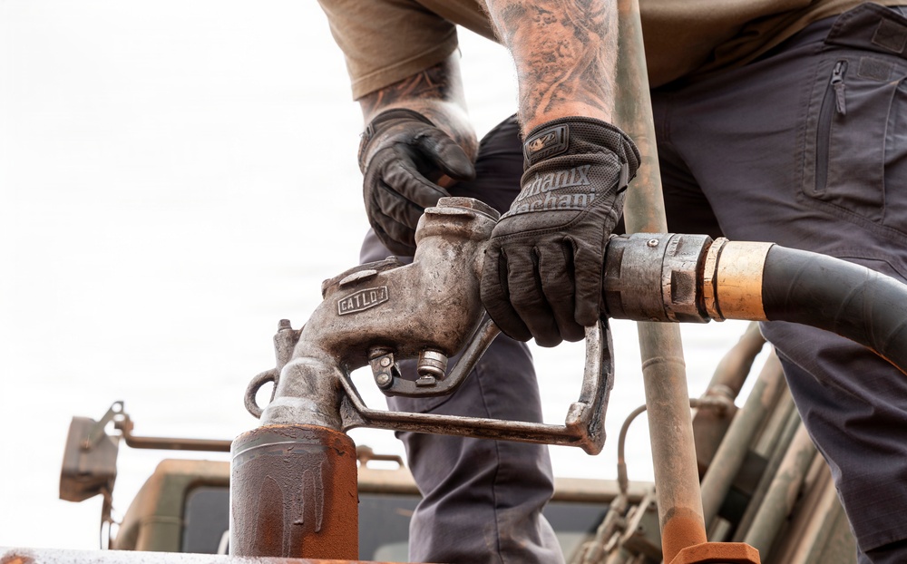 POL Airmen conduct fuel sampling and maintenance operations
