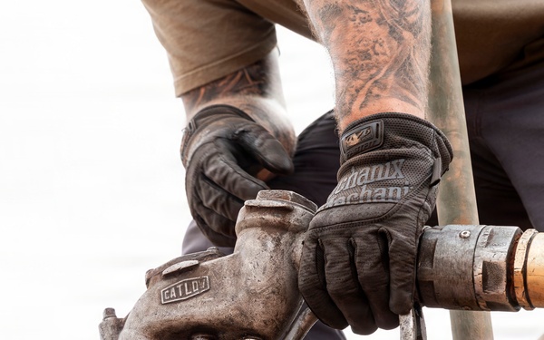 POL Airmen conduct fuel sampling and maintenance operations