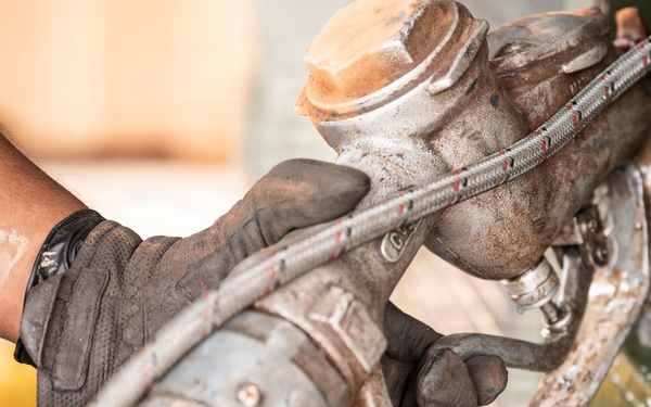 POL Airmen conduct fuel sampling and maintenance operations