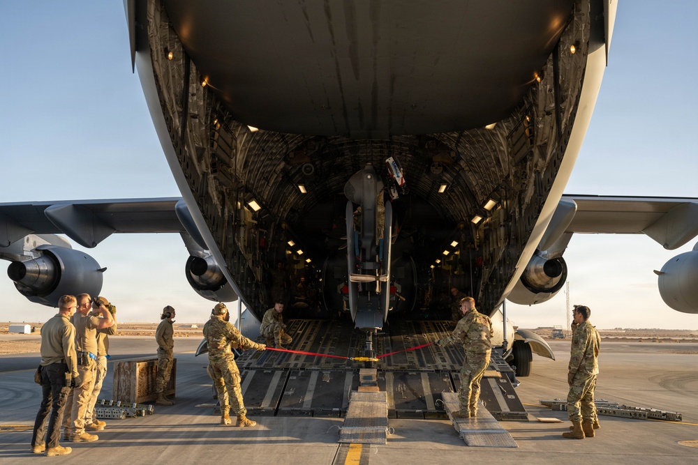 332nd ELRS unloads HH-60W from a C-17