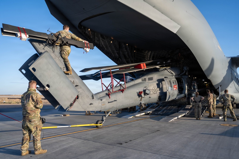 332nd ELRS unloads HH-60W from a C-17