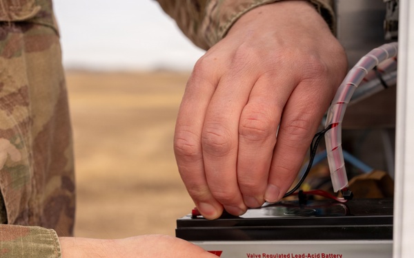 Airmen Maintain Fixed Base Weather Observation System