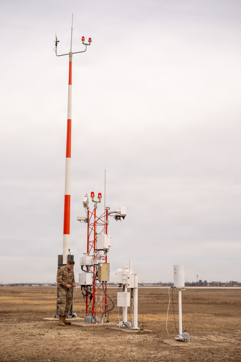 Airmen Maintain Fixed Base Weather Observation System
