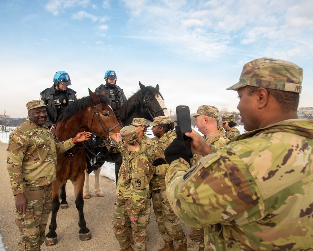 Secretary of War administers oath of enlistment