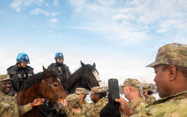 Secretary of War administers oath of enlistment