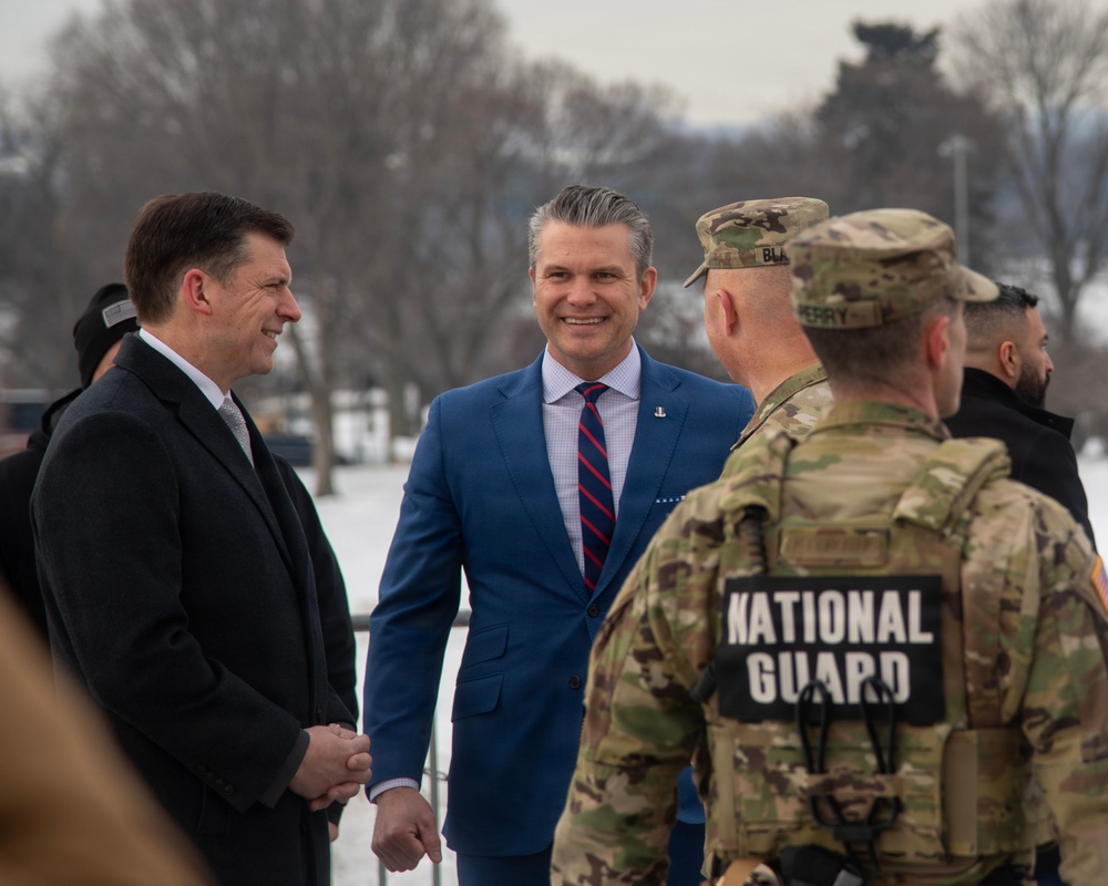 Secretary of War administers oath of enlistment