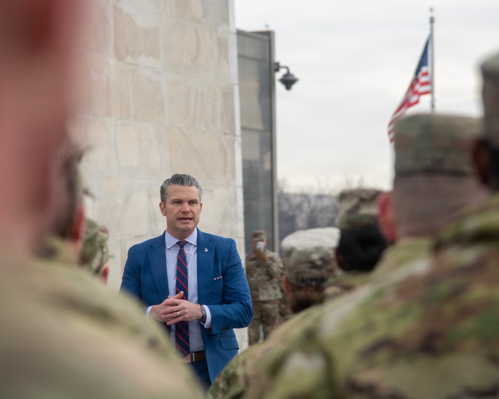 Secretary of War administers oath of enlistment