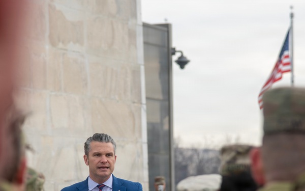 Secretary of War administers oath of enlistment