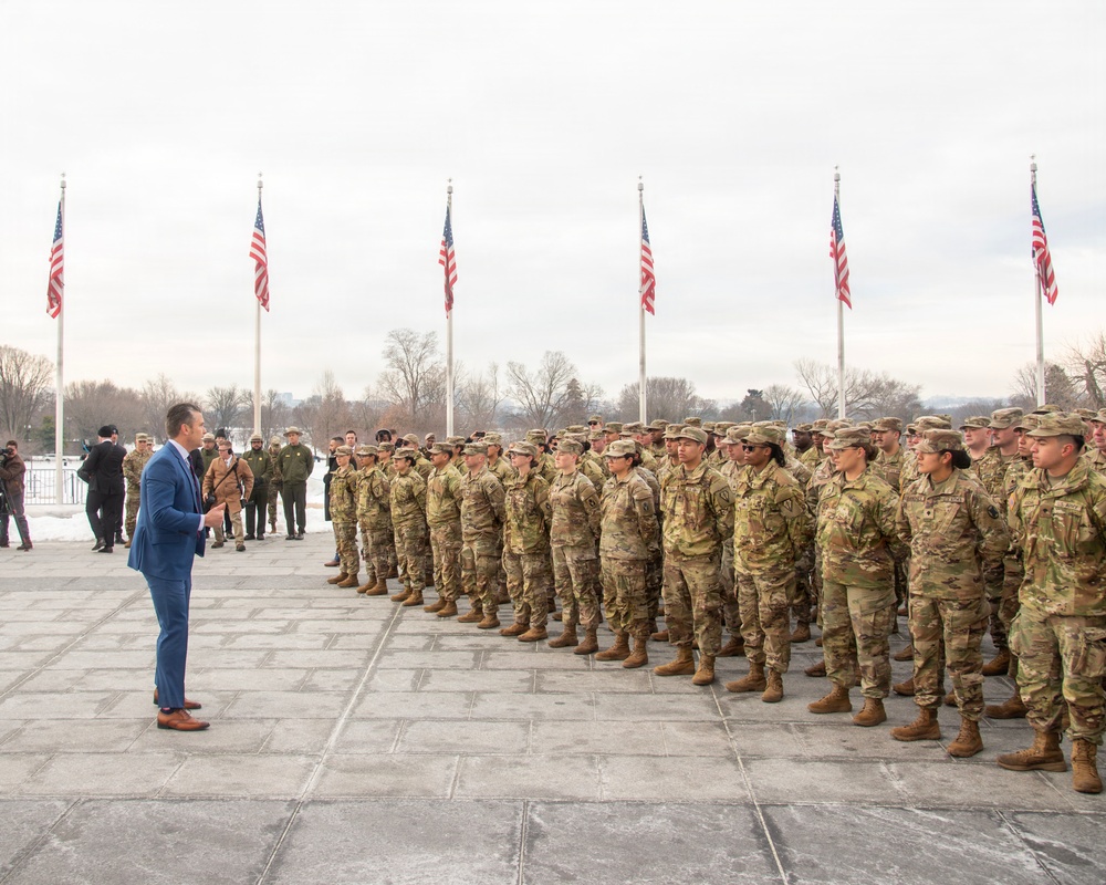 Secretary of War administers oath of enlistment
