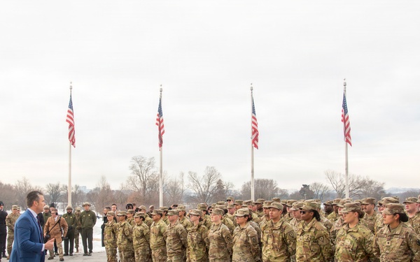 Secretary of War administers oath of enlistment