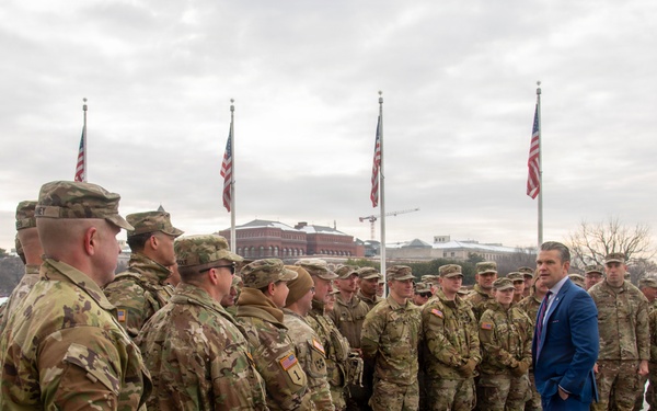 Secretary of War administers oath of enlistment