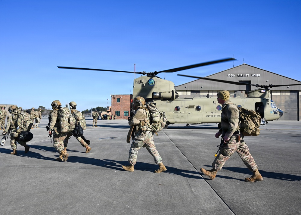165 AW Defenders hot load onto a CH-47 during employment exercise