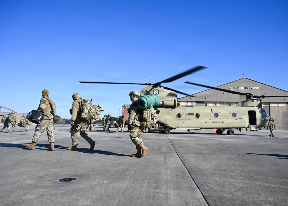 165 AW Defenders hot load onto a CH-47 during employment exercise