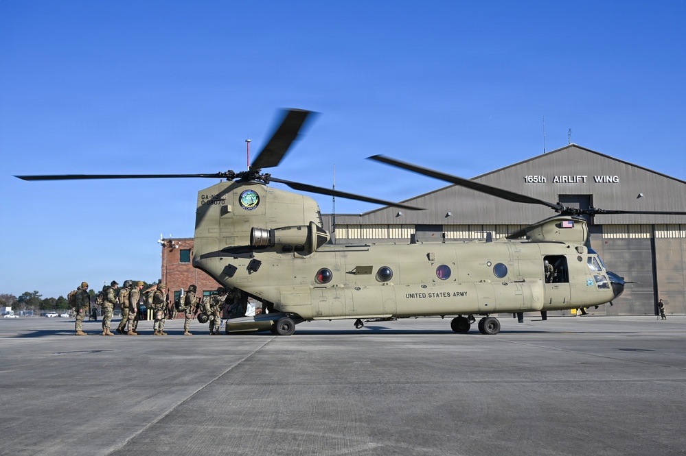 165 AW Defenders hot load onto a CH-47 during employment exercise