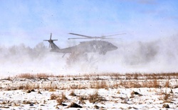 Photo Story: 120th Field Artillery Soldiers conduct winter sling-load ops with Black Hawk, Chinook helicopters, Part 2