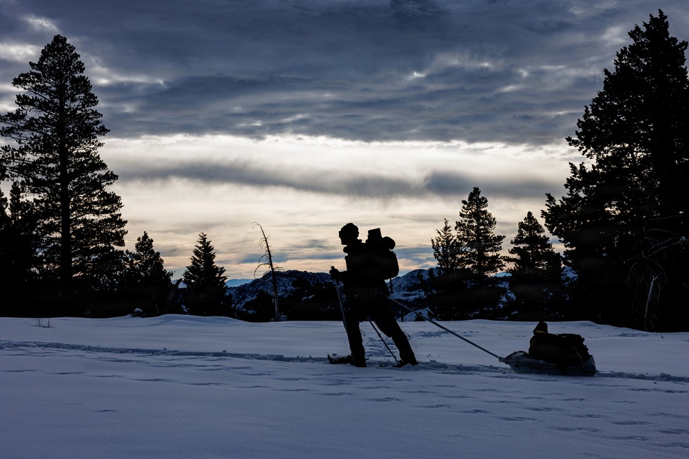 U.S. Marines with 2nd Bn., 4th Marines attend mountain survival class during MTX 1-26