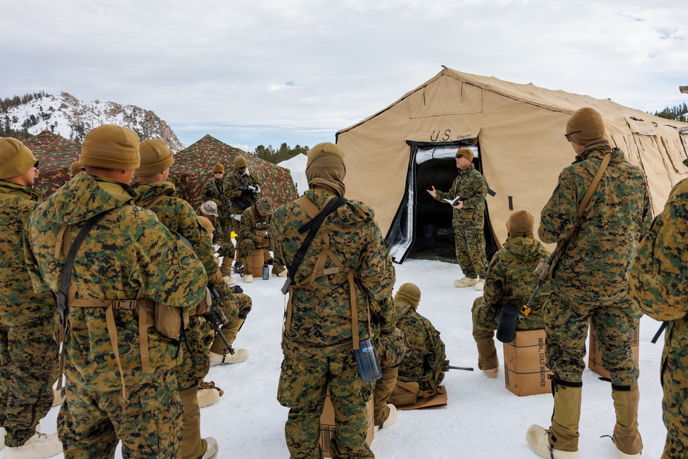 U.S. Marines with 2nd Bn., 4th Marines attend mountain survival class during MTX 1-26