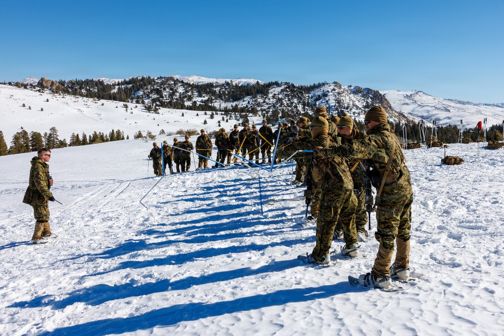 U.S. Marines with 2nd Bn., 4th Marines attend mountain survival class during MTX 1-26