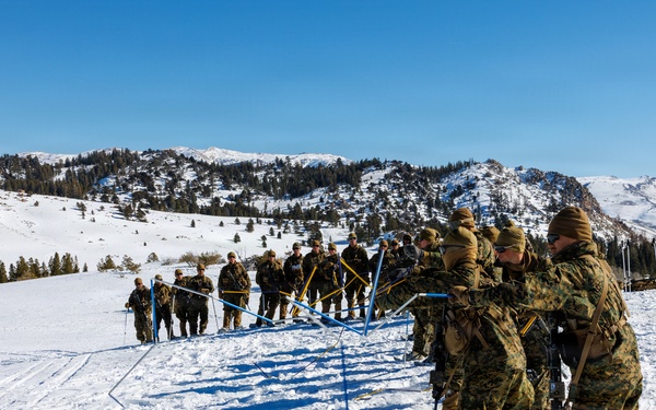 U.S. Marines with 2nd Bn., 4th Marines attend mountain survival class during MTX 1-26