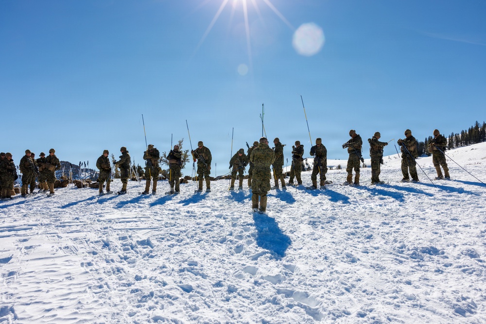 U.S. Marines with 2nd Bn., 4th Marines attend mountain survival class during MTX 1-26