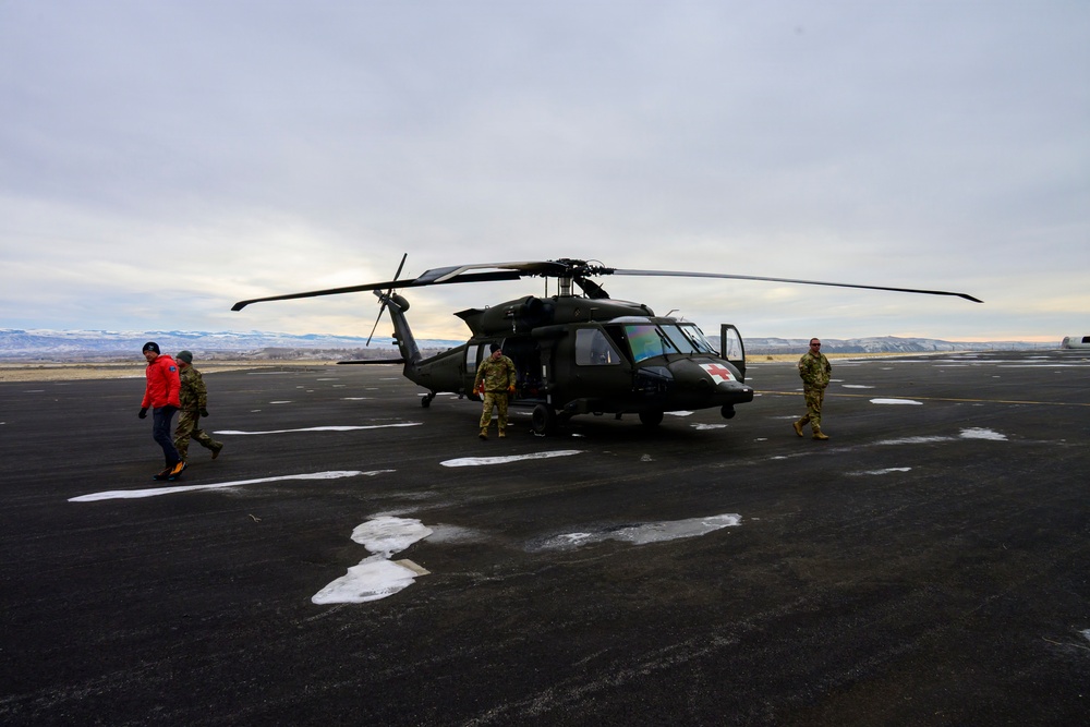 Wyoming Army Aviation teams and Big Horn County Serach and Rescue team perform hoist training