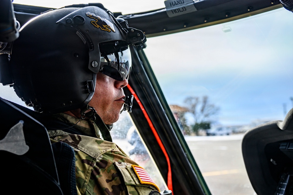 Wyoming Army Aviation teams and Big Horn County Serach and Rescue team perform hoist training