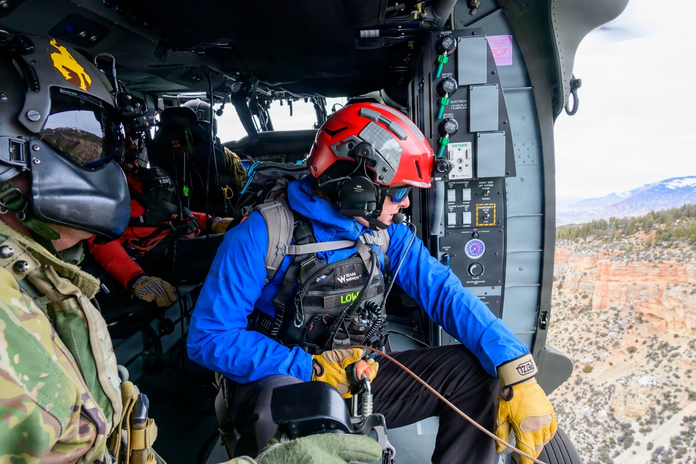 Wyoming Army Aviation teams and Big Horn County Serach and Rescue team perform hoist training
