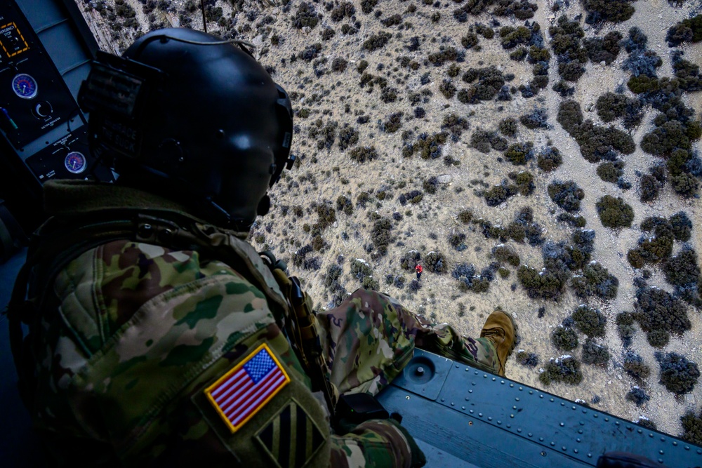 Wyoming Army Aviation teams and Big Horn County Serach and Rescue team perform hoist training