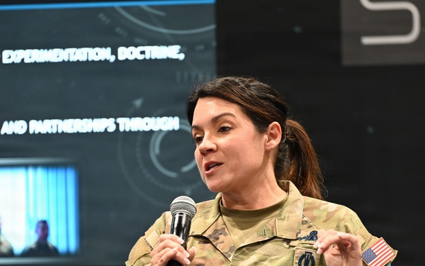 Col. Shannon DaSilva, Space Delta 10's commander, presents at the Space Mobility Conference